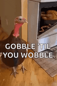 a turkey is standing in front of an oven and says `` gobble til you wobble '' .