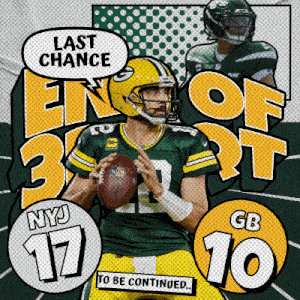 a green bay packers football player is holding a football in his hand