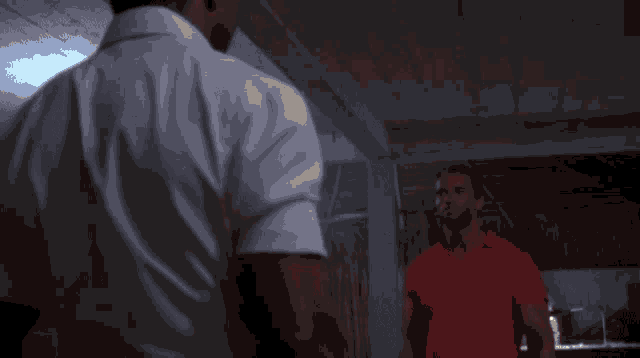 a close up of a person 's fist with a fireball behind it
