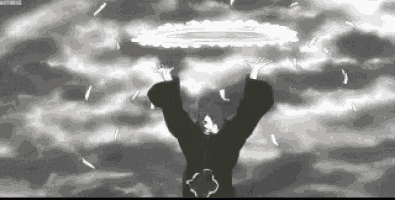 a black and white photo of a person holding a circle of light in the air .