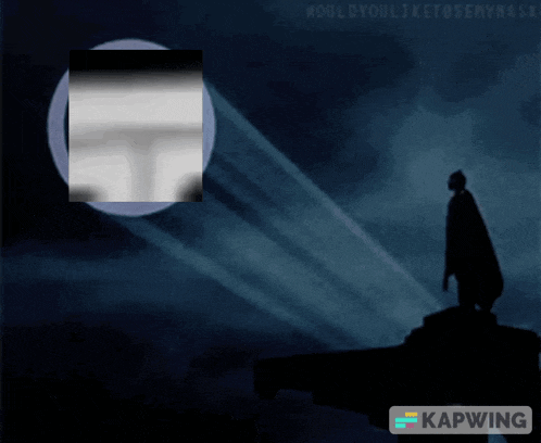 a man in a cape is standing in front of a full moon in a dark room