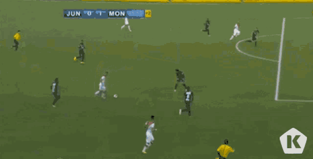 a soccer game is being played and the score is 1 to 2