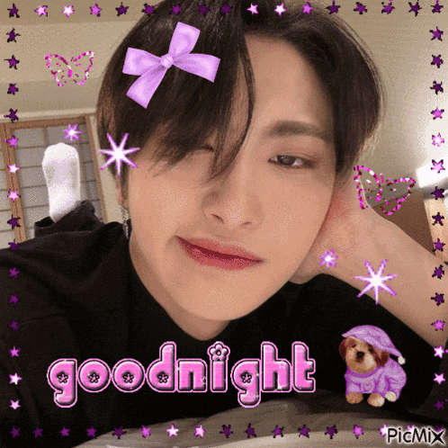 a picture of a boy with a purple bow on his head and the words goodnight on the bottom
