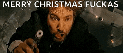 a man is pointing a gun at the camera with the words `` merry christmas fuckas '' written above him .