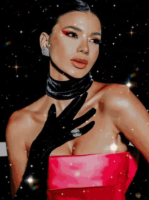 a woman wearing a choker and black gloves holds her hand to her chest