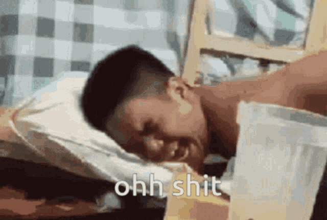 a man is laying on a bed with a pitcher of water next to him and the words ohh shit are visible