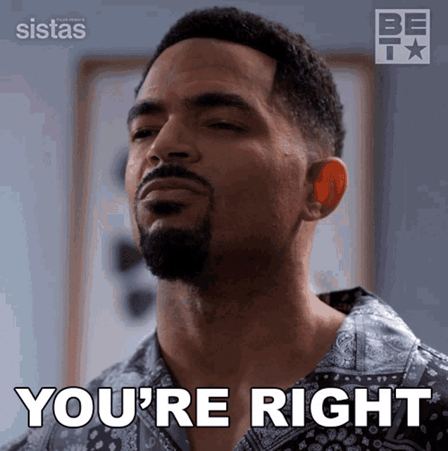 a man with a beard says " you 're right " in white letters