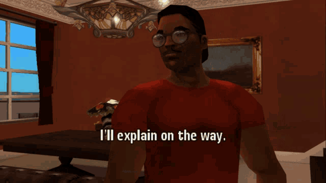 a man with glasses and a red shirt says i 'll explain on the way