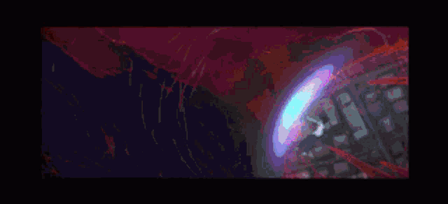 a blue light is coming out of a hole in a dark room