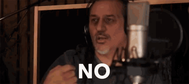 a man in a recording studio says no
