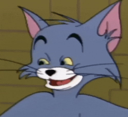 a close up of a cartoon cat 's face making a funny face
