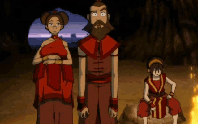 a group of cartoon characters are standing next to each other in a cave .