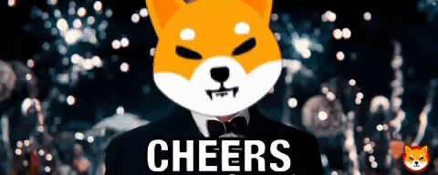a shiba inu dog wearing a tuxedo and bow tie with the words cheers written below it .