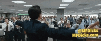 a man in a suit is standing in front of a crowd of people with the words @mfdicks mfdicks.com visible