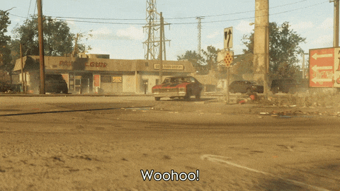 a red car is driving down a dirt road and the words woohoo are visible