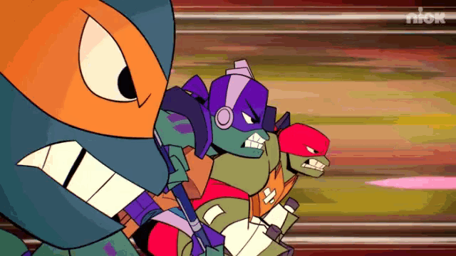 a group of teenage mutant ninja turtles are standing next to each other in a cartoon .