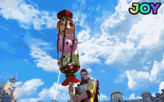 a man is holding a giant lollipop in front of a castle with the word joy above him
