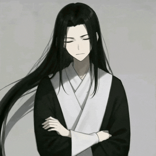 a man with long black hair has his arms crossed and his eyes closed