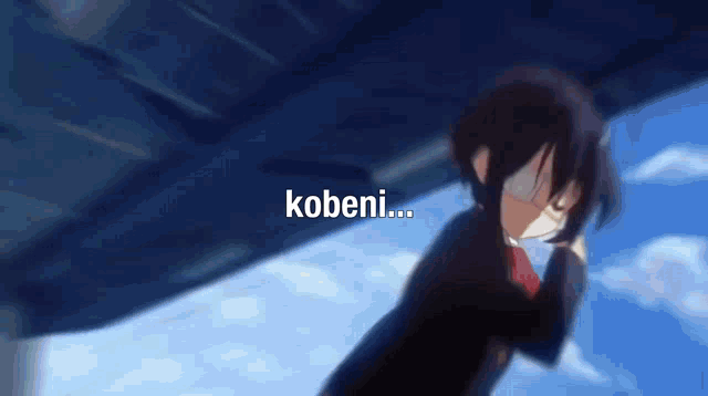 a blurry picture of a girl with the words kobeni on the bottom right