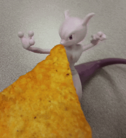 a pokemon figurine is sitting on top of a chip