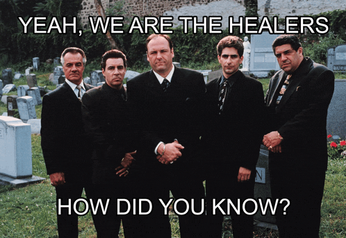 a group of men are standing in a cemetery with the caption yeah we are the healers