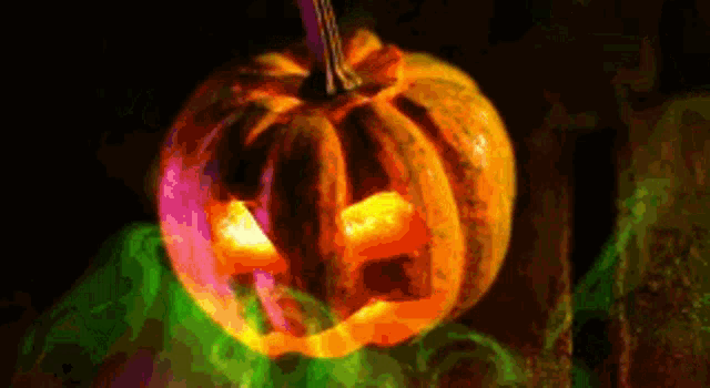 a carved pumpkin with a face carved into it