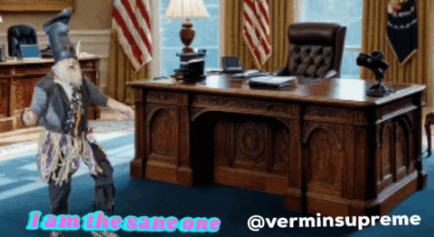 a man in a wizard costume is standing in front of a desk with the words " i am the sane one " written on it