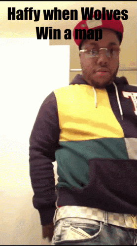 a man wearing glasses and a hat says haffy when wolves win a map on the bottom