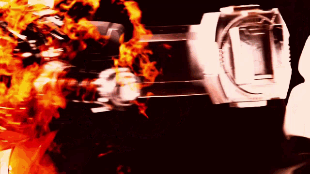 a black and white photo of a fire with the letter o on it