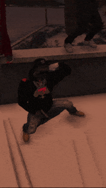 a man in a black sweatshirt with a bunny on it