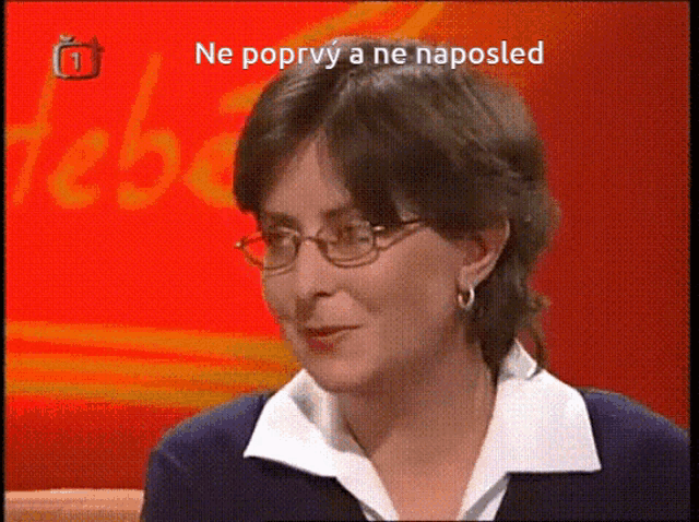 a woman wearing glasses is on a tv screen with the words ne poprvy a ne naposed on it