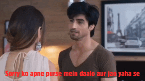 a man and a woman are looking at each other with a caption that says sorry ko apne purse mein