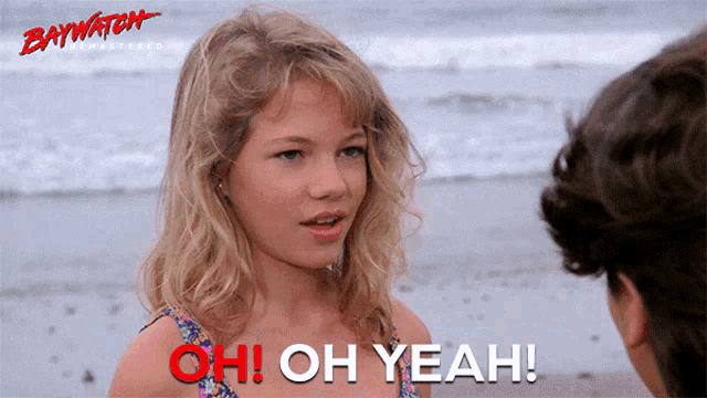 a girl on the beach with the words oh oh yeah behind her