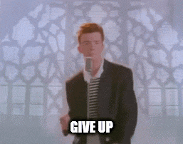 a man in a suit is dancing in front of a microphone with the words give up written below him