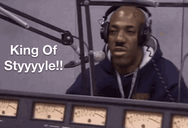 a man wearing headphones in front of a microphone says " king of styyyyle "