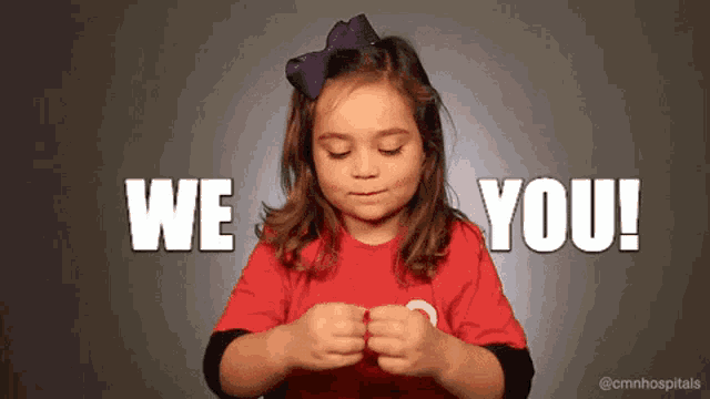 a little girl with a purple bow on her head says " we you "