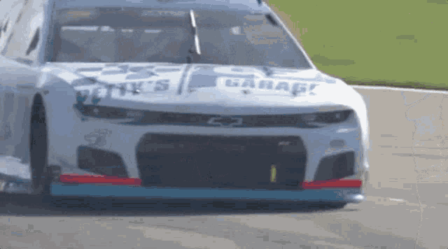 a race car that has the word garage on the front