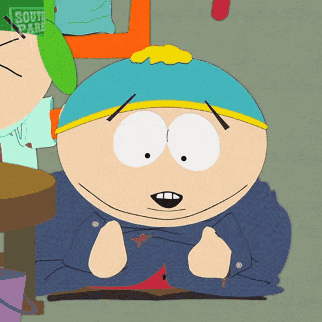 a cartoon character from south park is sitting on the ground