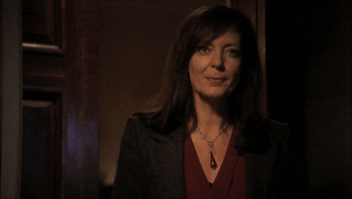 a woman says " yes sir we do " in a dark room