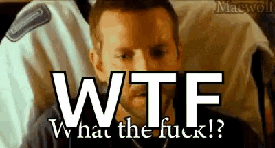 a man sitting in a chair with the words wtf what the fuck