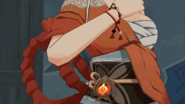 a woman with a bandage on her arm is wearing a bracelet with a red flame on it