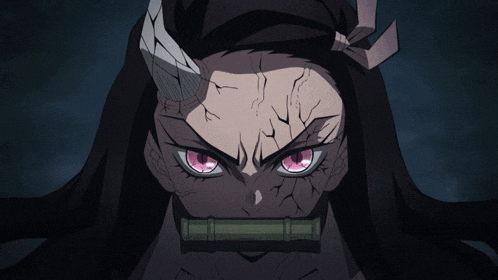 a close up of a girl 's face with a very angry look on her face