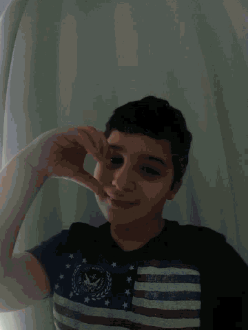 a young boy wearing a shirt that says " i 'm sorry i 'm not "