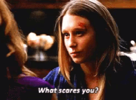 a woman with a bruise on her forehead is talking to another woman and says " what scares you "