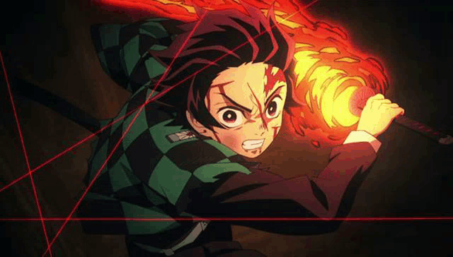 a young boy is holding a torch and a sword in a dark room .