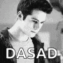 a black and white photo of a young man with the words `` dasad '' written on it .