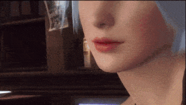 a close up of a woman 's face with a red lip