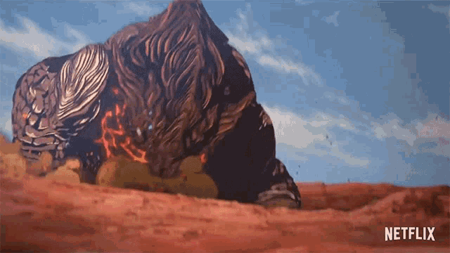 a netflix ad shows a monster crawling through the dirt