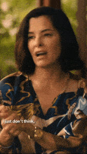 a woman in a floral shirt says just don t think