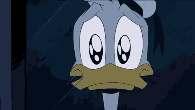 a close up of donald duck 's face in a cartoon